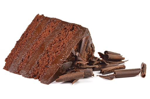 Chocolate cake slice with curl on white background